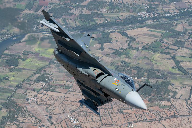 Tejas LA-5018 of No. 18 Squadron banking steeply over farmland