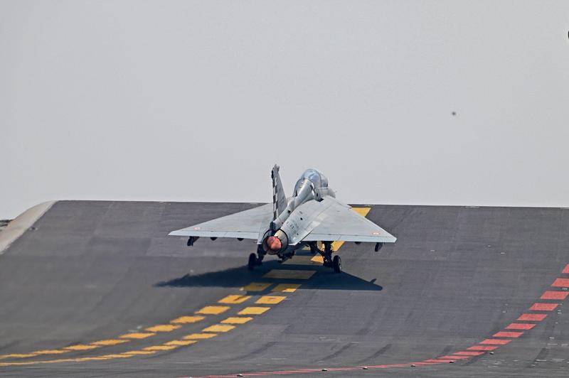 Naval Tejas leaving INS Vikrant’s ski-jump with its afterburner lit